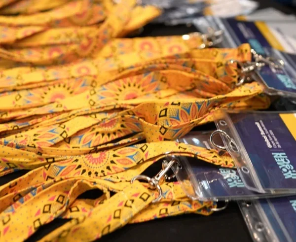 Yellow shweshwe fabric lanyards with badge holders, handmade for the Women in Tech Global Congress